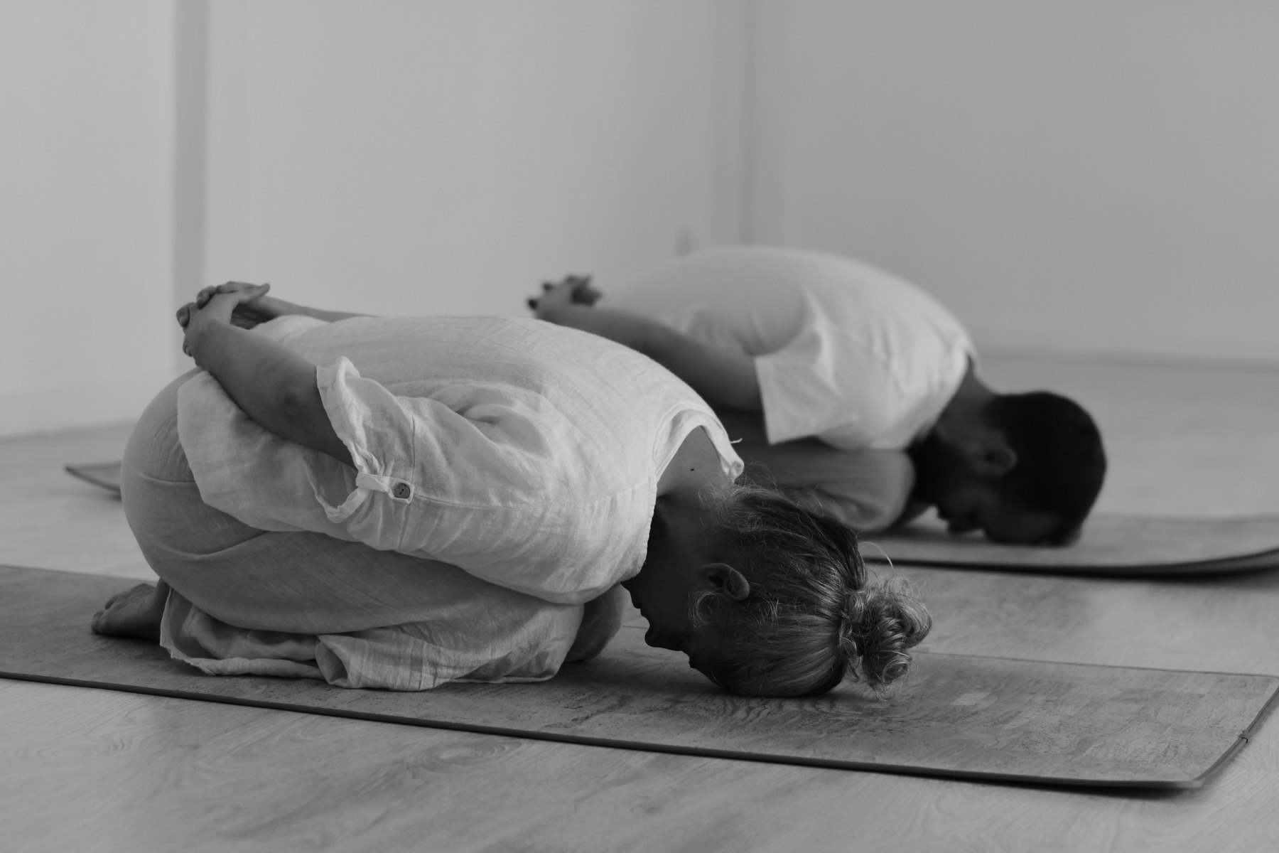 Students practising asana in class